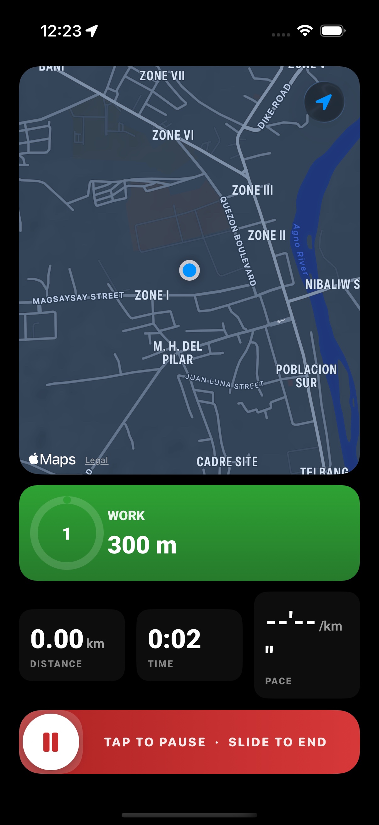 Active run screen with live route map, pace, and pause control